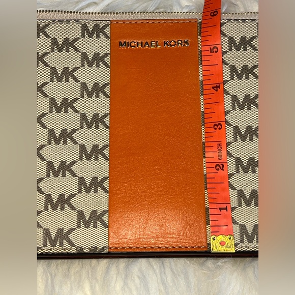Michael Kors, orange and tan clutch with zipper. In great condition. LIKE NEW!! - Picture 11 of 13